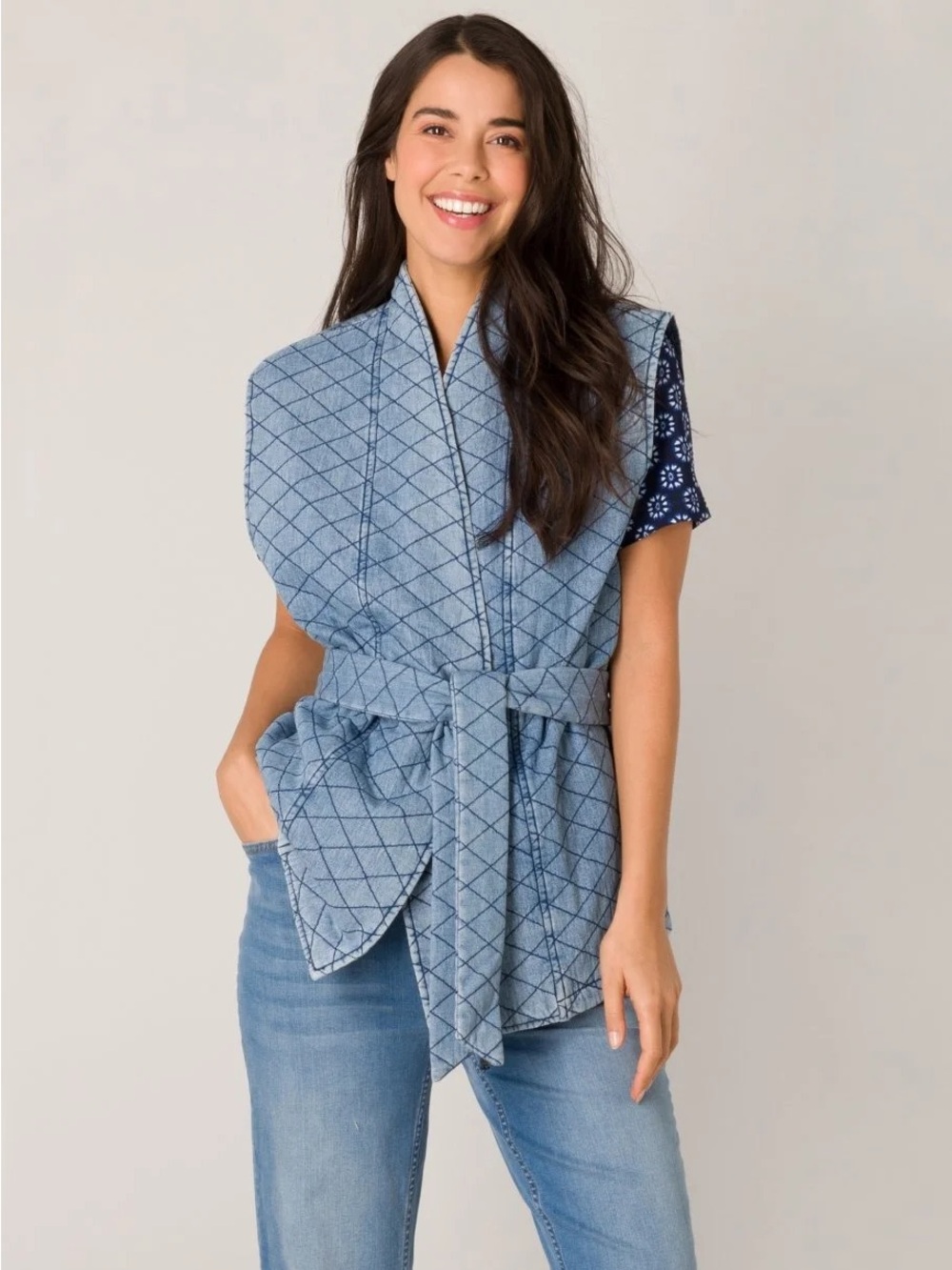 Yest quilted denim vest with a V-neckline and a self-tie belt
